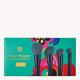 Makeup brush set packaging with 'DB' brand logo on a colorful background