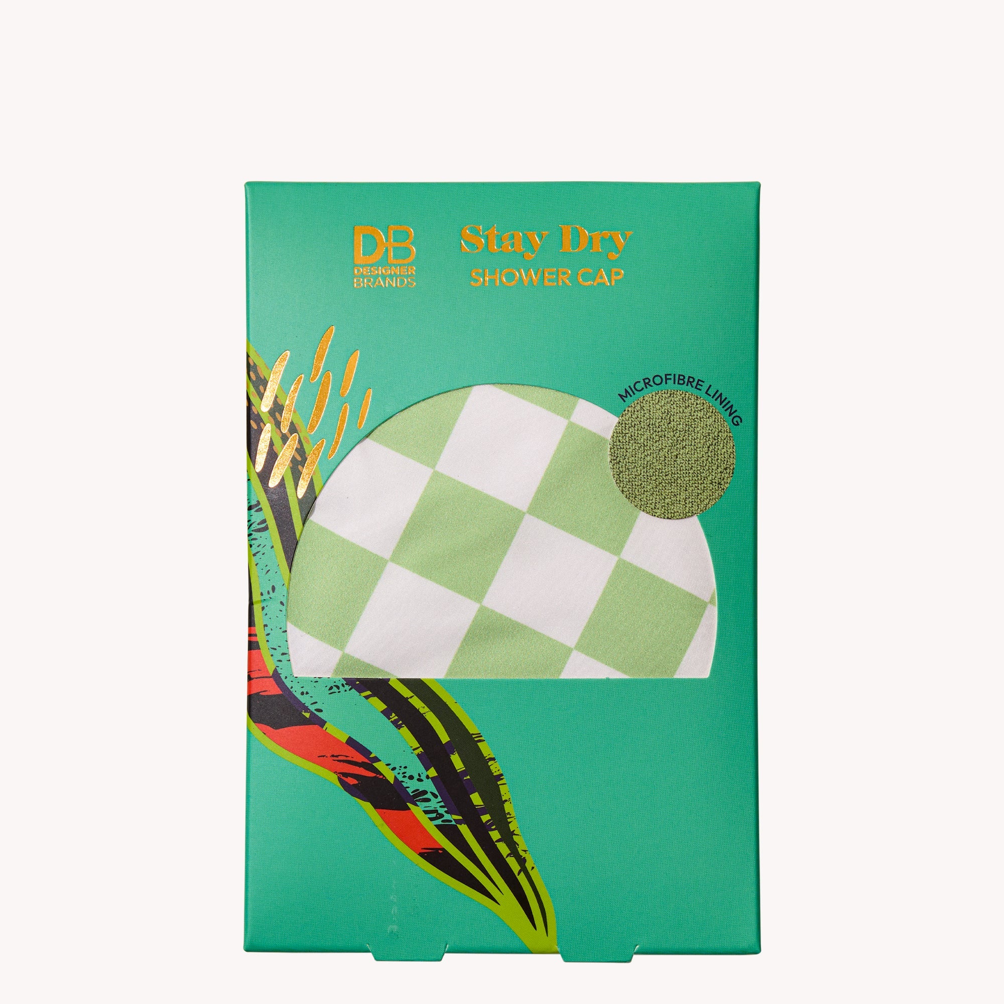 Green and white checkered shower cap packaging with “Stay Dry Shower Cap” text and striking leaf design on a teal background.