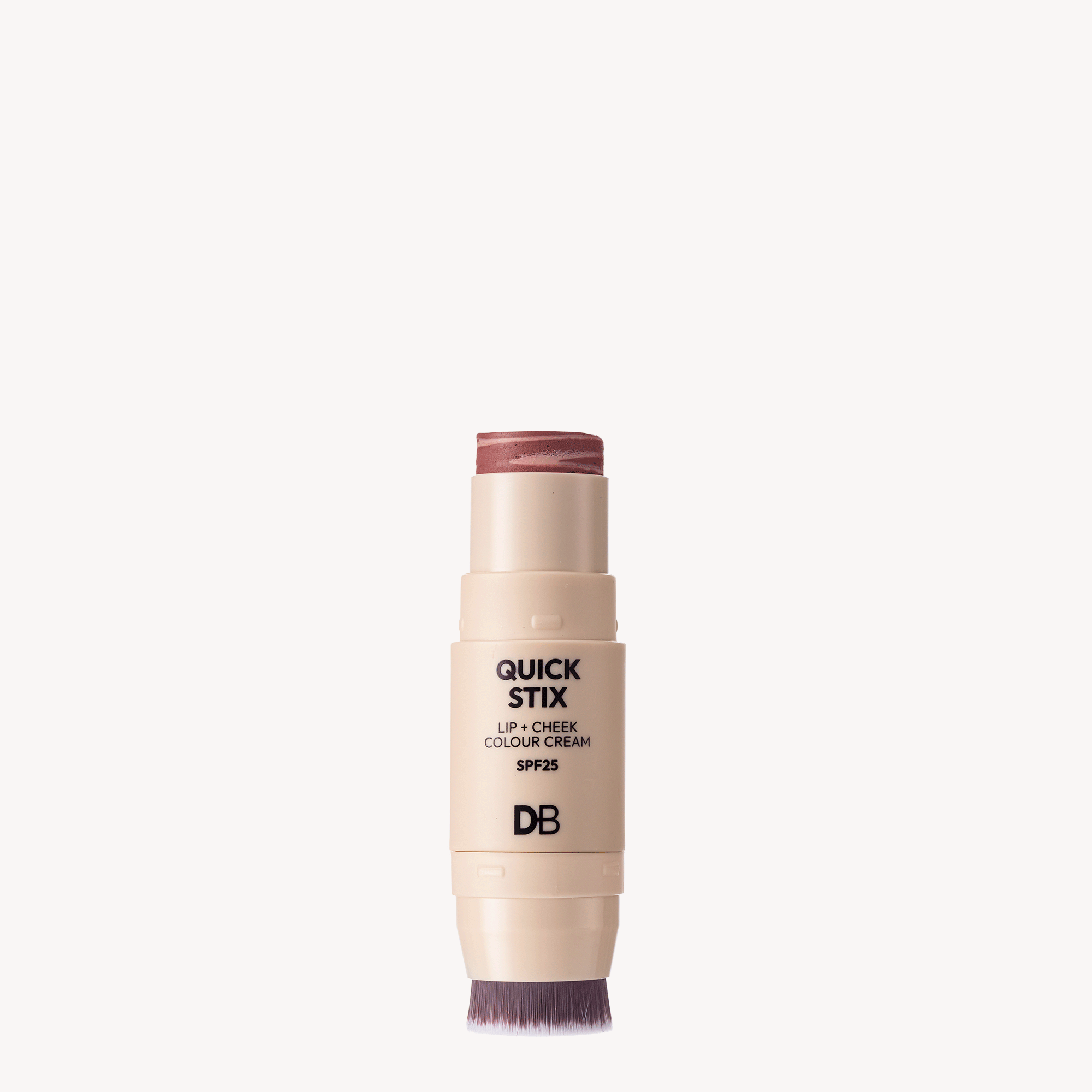 Lip and cheek color cream stick with 'DB' branding on a white background
