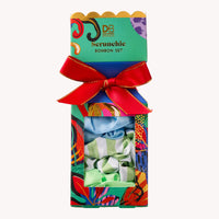 Colorful box of Scrunchie bonbons with a red bow on a white background