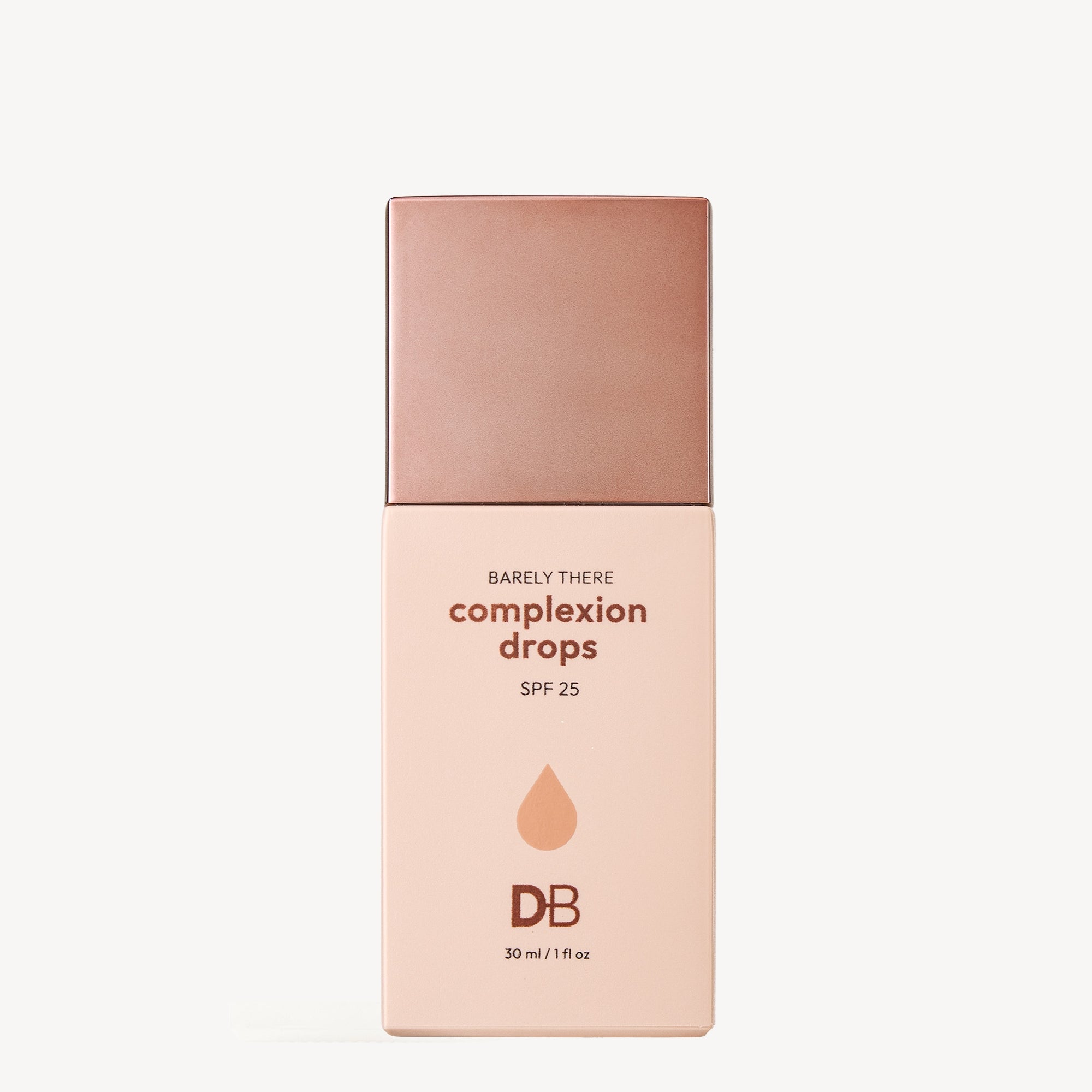 Minimalist design of a complexion drops bottle with rose gold cap. Label reads "Barely There Complexion Drops SPF 25" by DB, 30 ml size.